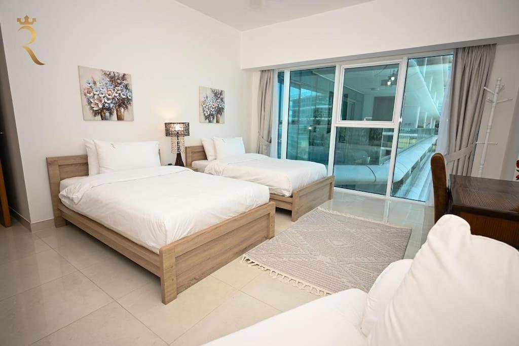 2br Enchanted Hideaway With Pool & Gym Al Raha Apartment *